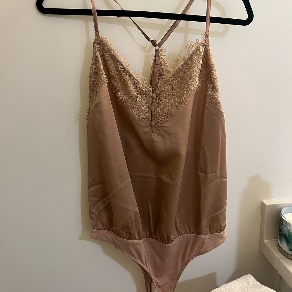 pink lily beige bodysuit